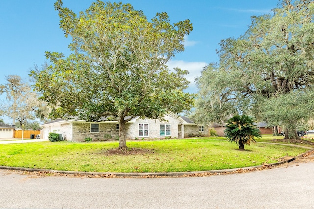 view of front of house with a front lawn