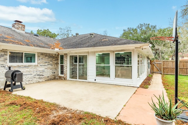 rear view of house featuring a patio area