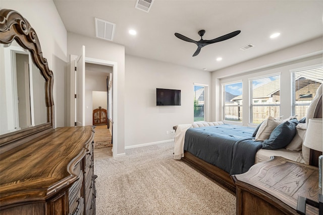 carpeted bedroom with ceiling fan