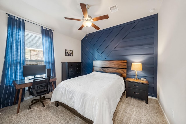 carpeted bedroom featuring ceiling fan and lofted ceiling