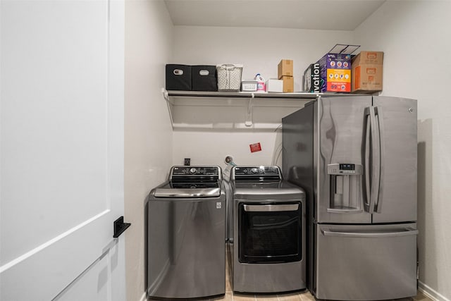 laundry room with washer and clothes dryer