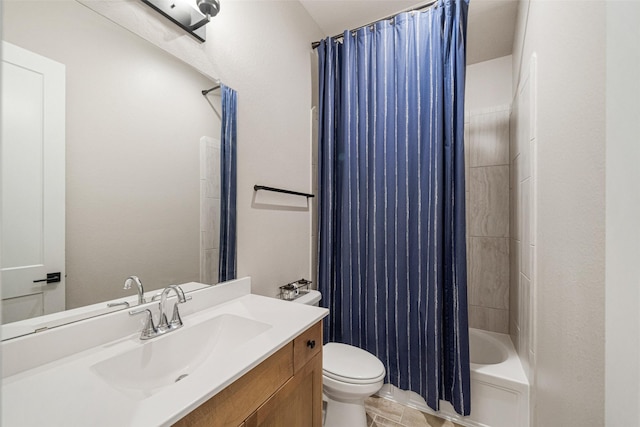 full bathroom featuring vanity, toilet, and shower / bath combo with shower curtain