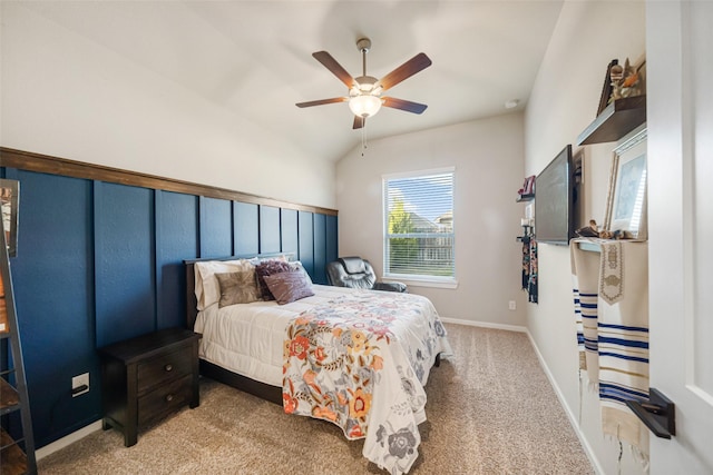 carpeted bedroom featuring ceiling fan and lofted ceiling