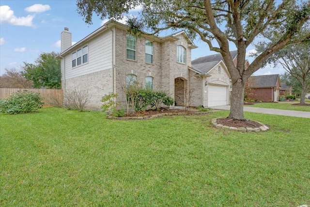 view of front facade featuring a garage and a front lawn