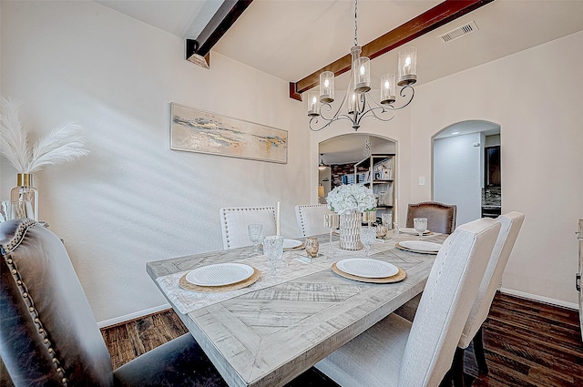 dining area featuring beam ceiling, a chandelier, and dark hardwood / wood-style floors