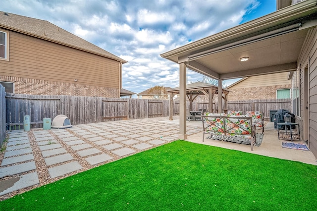 view of yard with a patio area