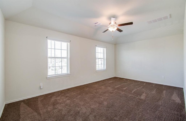 carpeted empty room with ceiling fan