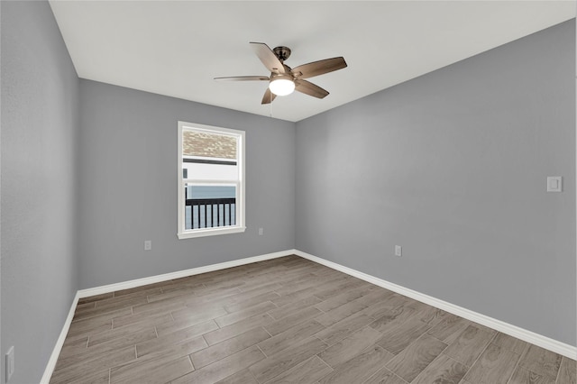 unfurnished room with ceiling fan