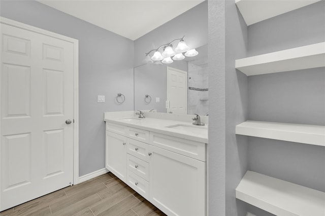 bathroom with a shower and vanity