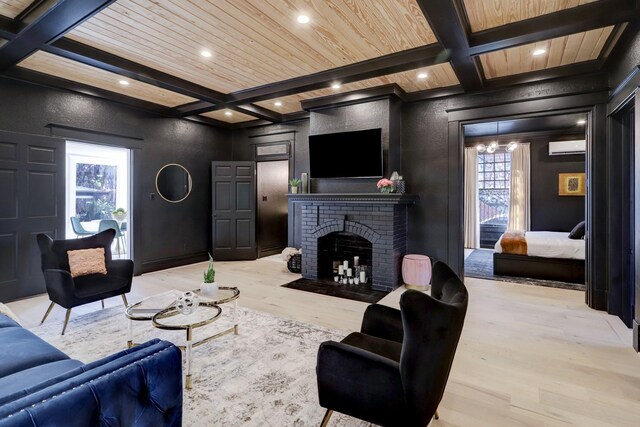 living room featuring a wall mounted AC, wooden ceiling, light hardwood / wood-style floors, and a brick fireplace