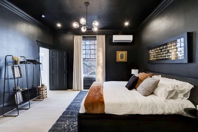 bedroom with crown molding, light hardwood / wood-style floors, a wall mounted air conditioner, and an inviting chandelier