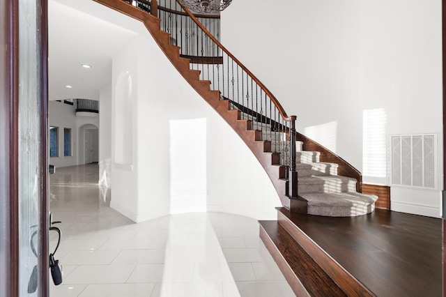 staircase with tile patterned flooring