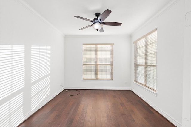 unfurnished room featuring ceiling fan, ornamental molding, and dark wood-type flooring