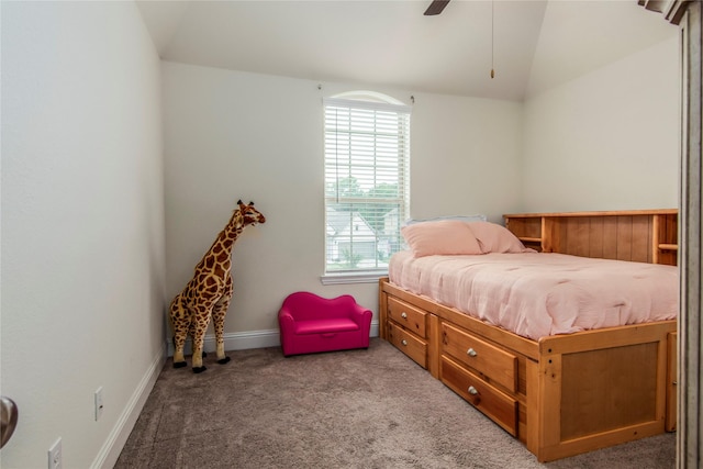 carpeted bedroom featuring ceiling fan and vaulted ceiling