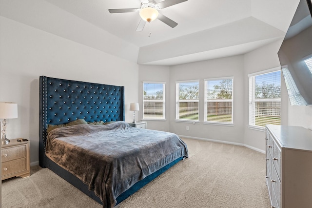 bedroom with ceiling fan and light colored carpet