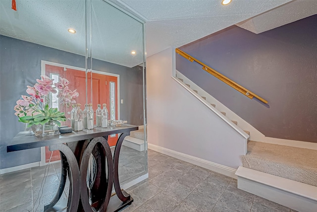 interior space featuring a textured ceiling