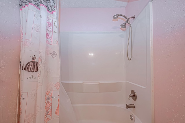 bathroom with shower / tub combo with curtain