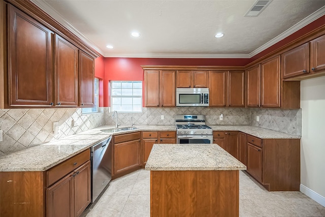 kitchen featuring crown molding, sink, light stone countertops, appliances with stainless steel finishes, and tasteful backsplash