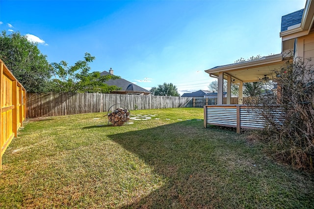 3815 Founders Dr, Needville, TX 77461 - fenced backyard featuring ceiling fan