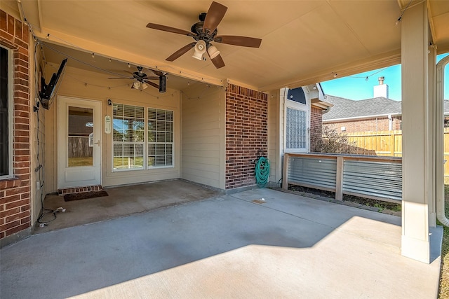 view of patio featuring ceiling fan