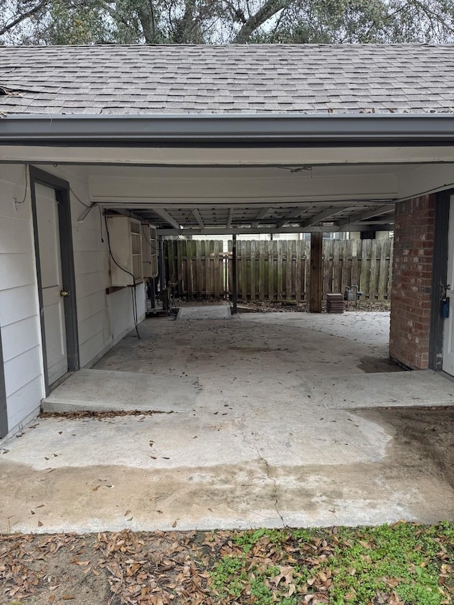 garage with a carport