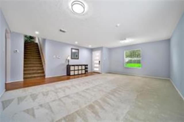 basement with light carpet