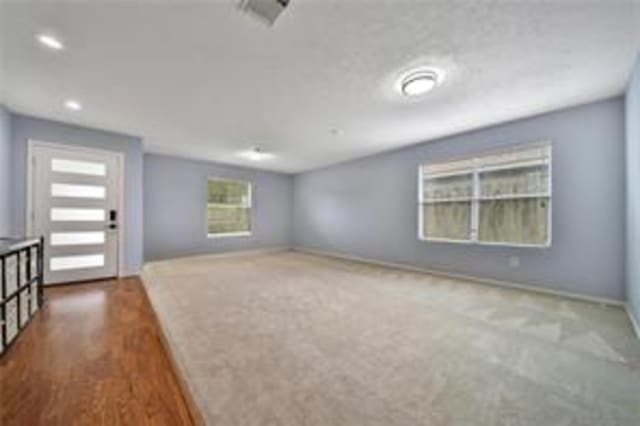 interior space with dark wood-type flooring