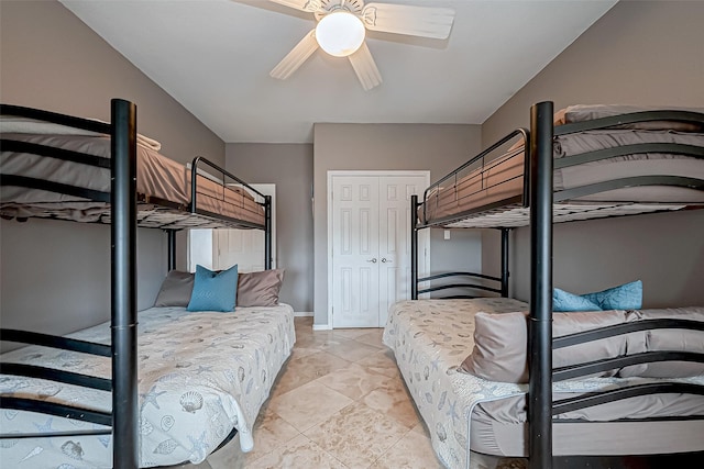 bedroom with light tile patterned floors and ceiling fan