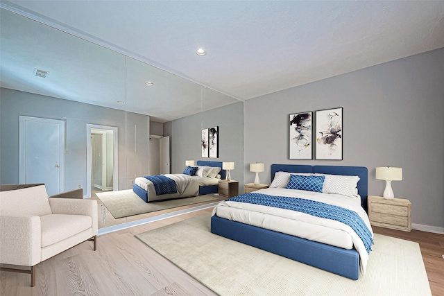 bedroom featuring hardwood / wood-style flooring