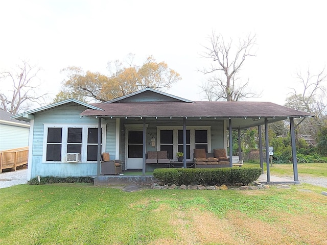 view of front of house with a porch and a front yard