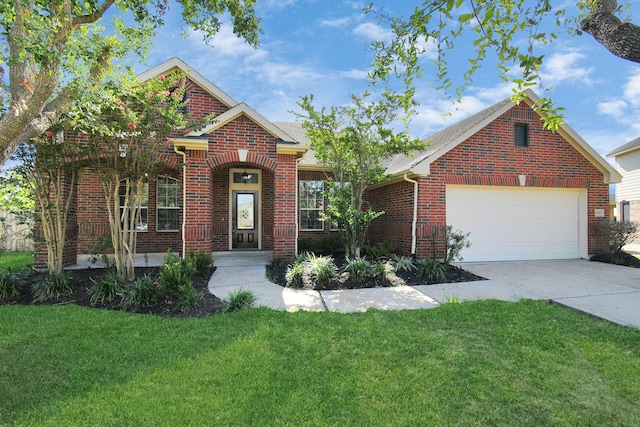 front of property with a garage and a front lawn