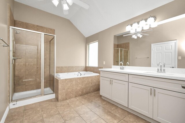 bathroom with vanity, tile patterned floors, vaulted ceiling, ceiling fan, and separate shower and tub