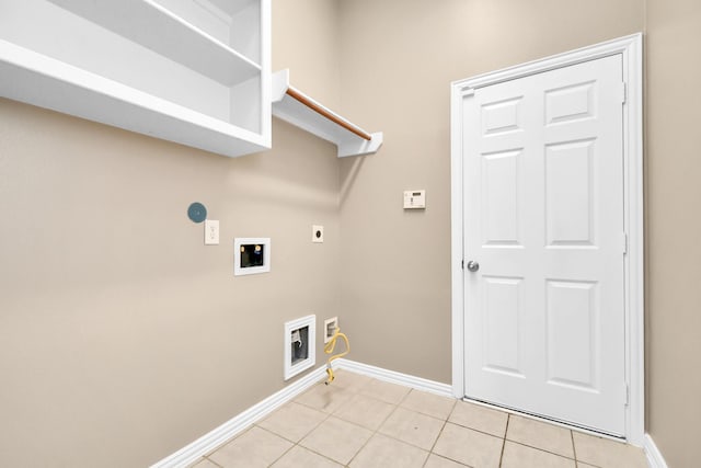 laundry room featuring hookup for an electric dryer, washer hookup, light tile patterned floors, and gas dryer hookup