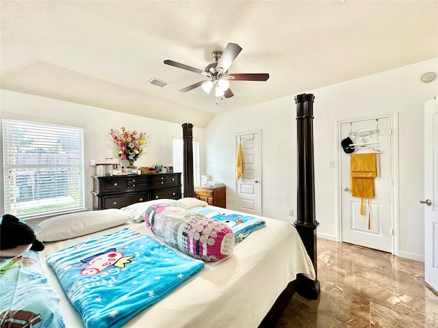 bedroom with ceiling fan and vaulted ceiling