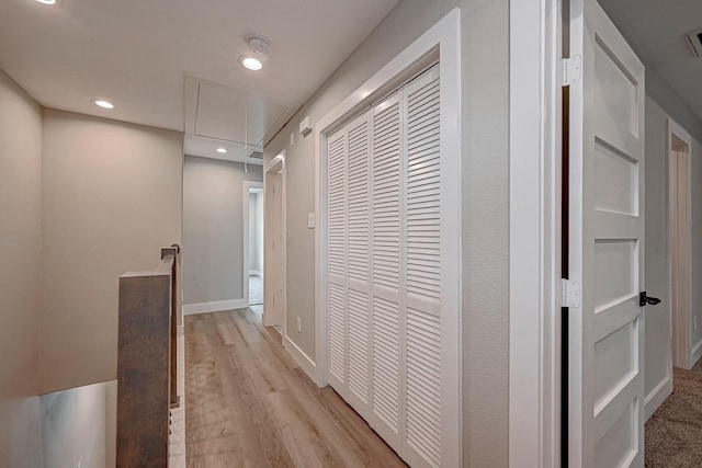 corridor featuring light hardwood / wood-style floors