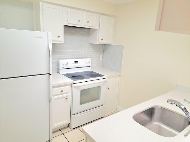 kitchen featuring white cabinetry, sink, backsplash, white appliances, and light tile patterned flooring