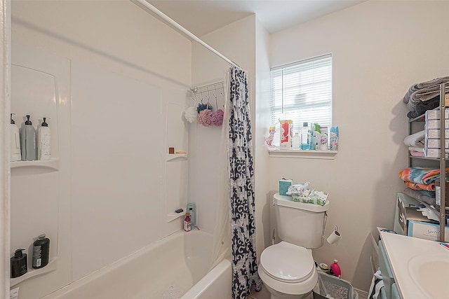 full bathroom featuring shower / bath combination with curtain, toilet, and vanity