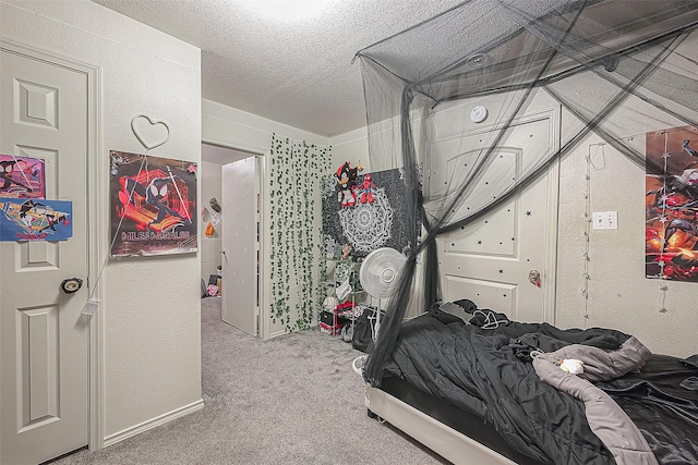 carpeted bedroom featuring a textured ceiling