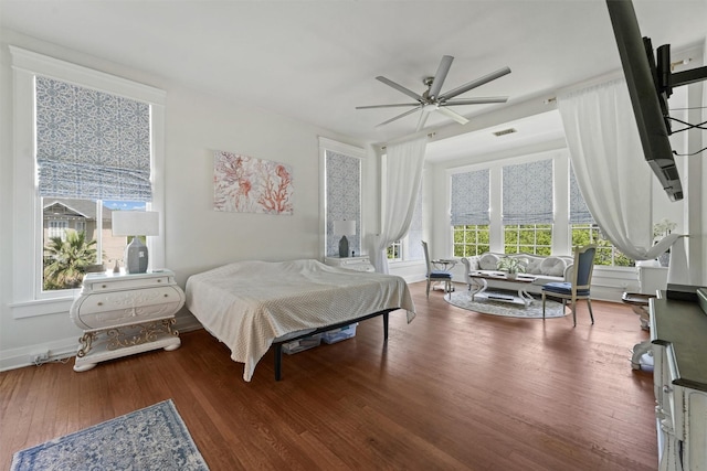 bedroom featuring ceiling fan and hardwood / wood-style flooring