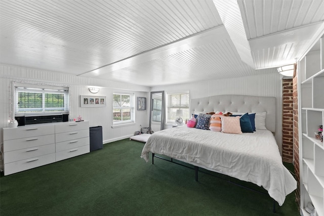 bedroom featuring dark colored carpet