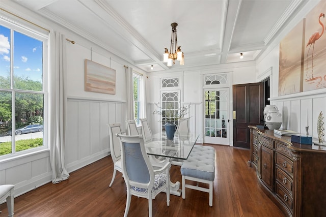 dining space with beamed ceiling, dark hardwood / wood-style floors, a wealth of natural light, and coffered ceiling