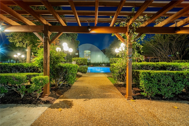 patio at twilight with a pergola