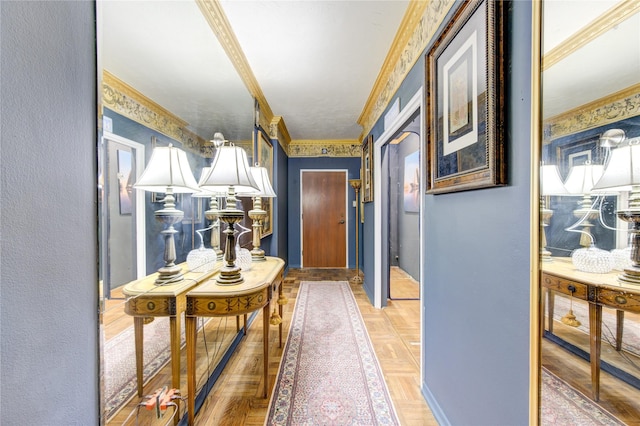 hall featuring parquet floors and ornamental molding