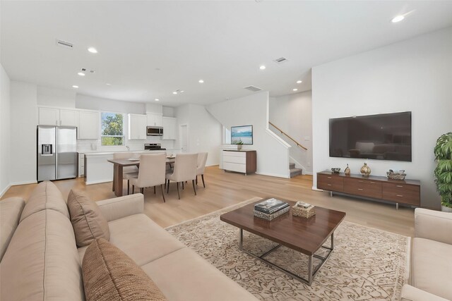 living room featuring light hardwood / wood-style floors