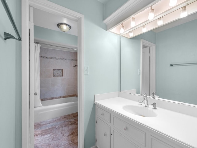 bathroom with shower / bath combo with shower curtain and vanity