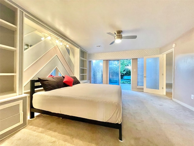 bedroom with ceiling fan, carpet floors, and access to outside