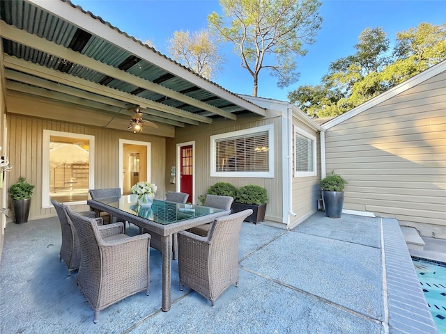 view of patio / terrace featuring ceiling fan