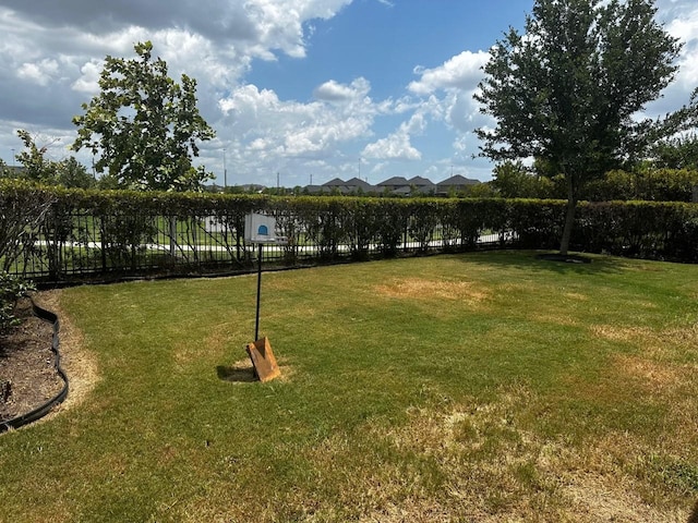 12209 Renewal Way, Houston, TX 77047 - view of home's community with a yard