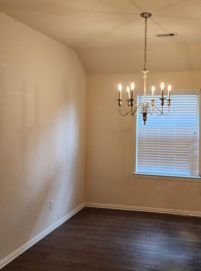 12209 Renewal Way, Houston, TX 77047 - unfurnished dining area with vaulted ceiling, dark hardwood / wood-style flooring, and a chandelier