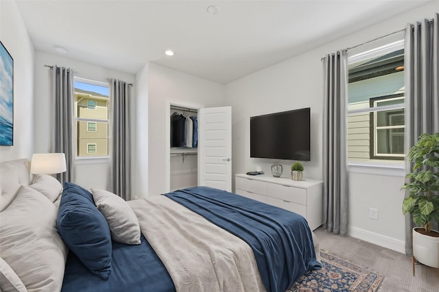 carpeted bedroom featuring a closet